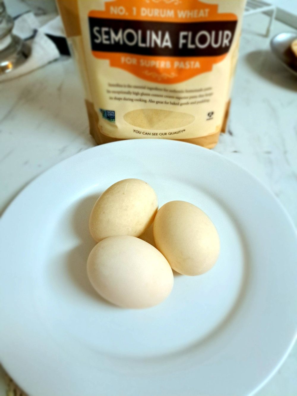 Three Duck Eggs on a white plate